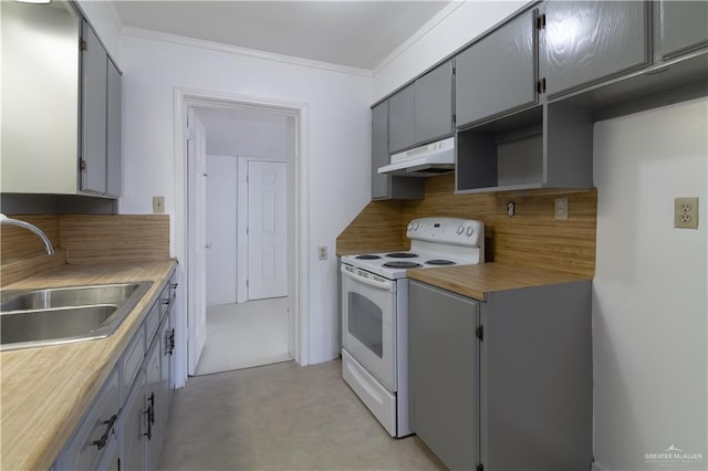 kitchen with electric range, backsplash, gray cabinetry, and sink