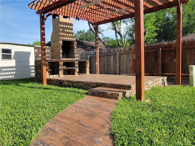 2408 River Oaks Ln, Edinburg, TX 78539 - view of yard with a pergola and a fireplace