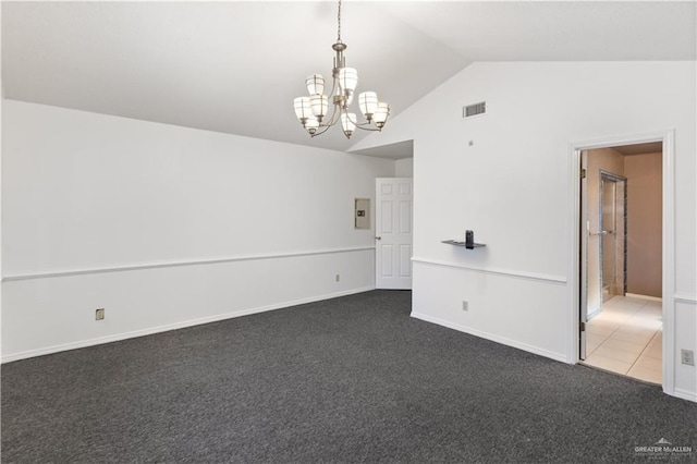 2408 River Oaks Ln, Edinburg, TX 78539 - unfurnished room with dark carpet, a chandelier, lofted ceiling, baseboards, and electric panel