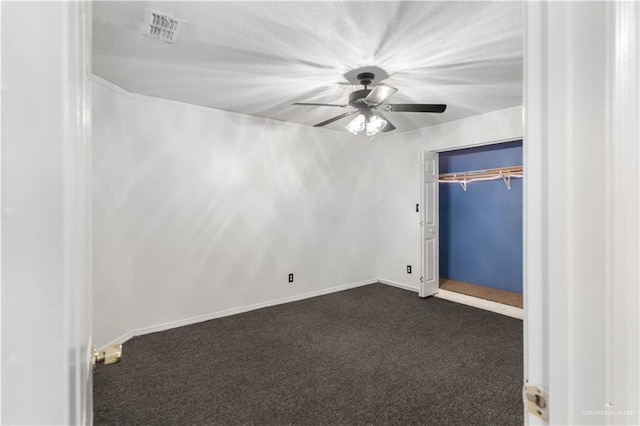 2408 River Oaks Ln, Edinburg, TX 78539 - unfurnished room featuring dark carpet and a ceiling fan