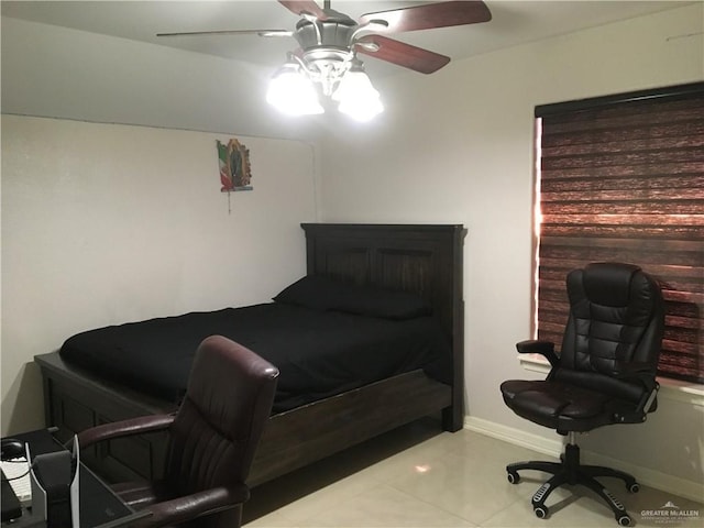 bedroom with ceiling fan, baseboards, and tile patterned floors