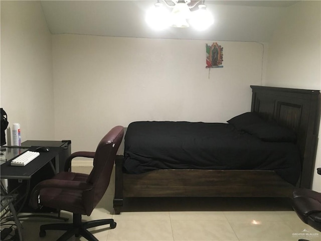 bedroom featuring light tile patterned floors