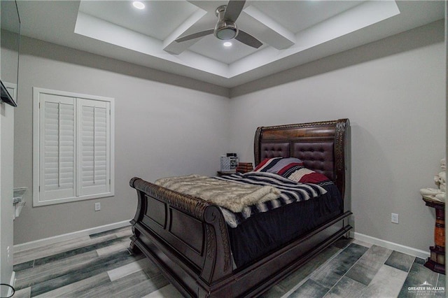 bedroom featuring ceiling fan, baseboards, wood finished floors, and recessed lighting