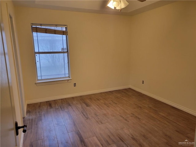 unfurnished room with hardwood / wood-style flooring and ceiling fan