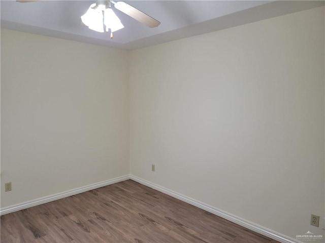 spare room featuring hardwood / wood-style flooring