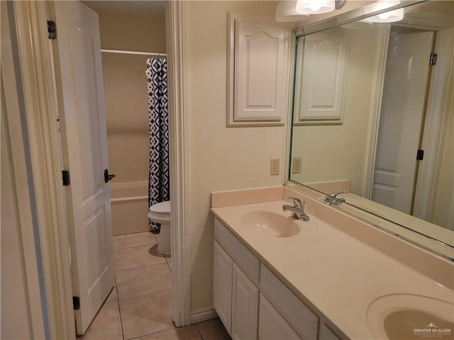 full bathroom featuring tile patterned flooring, vanity, shower / tub combo, and toilet