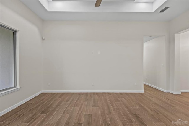 empty room with wood-type flooring