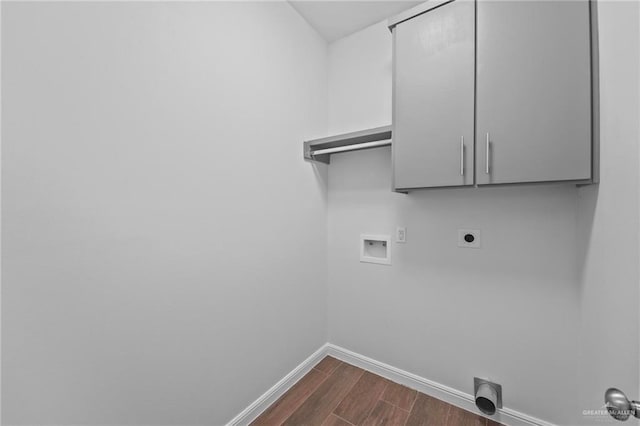 washroom featuring cabinets, washer hookup, and hookup for an electric dryer