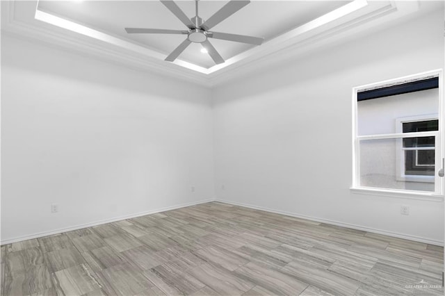 3804 Crimson Ave, Mission, TX 78574 - spare room with ceiling fan, a raised ceiling, and baseboards