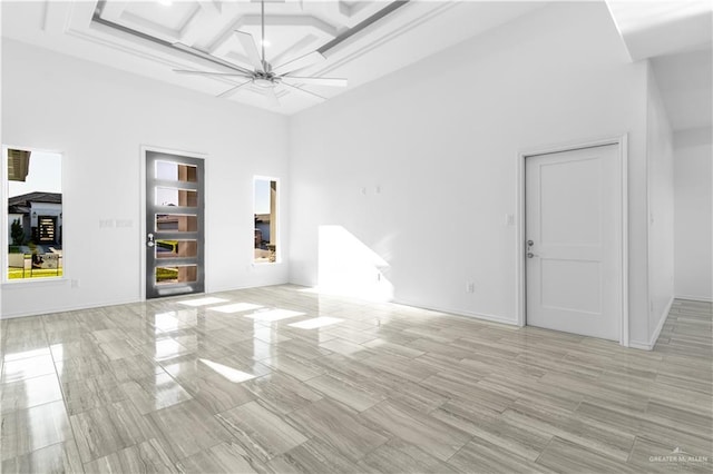 3804 Crimson Ave, Mission, TX 78574 - spare room featuring coffered ceiling, beamed ceiling, a towering ceiling, and a ceiling fan