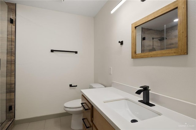 bathroom featuring tile patterned flooring, vanity, toilet, and an enclosed shower