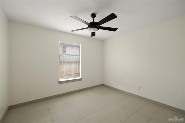 spare room with ceiling fan