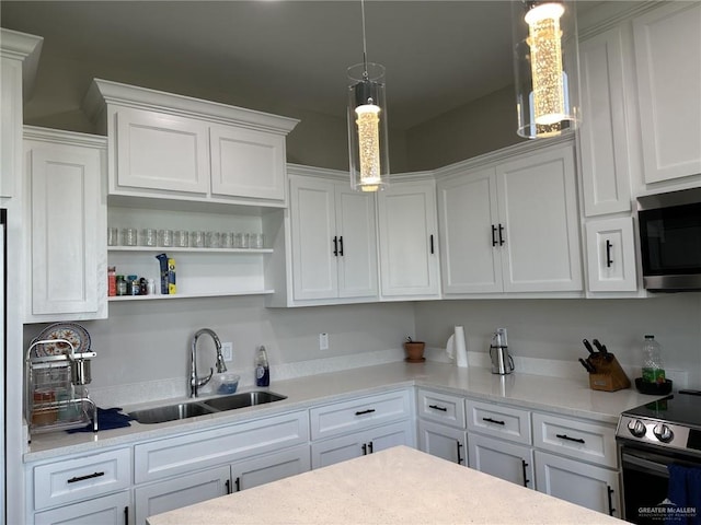 kitchen with white cabinetry and sink