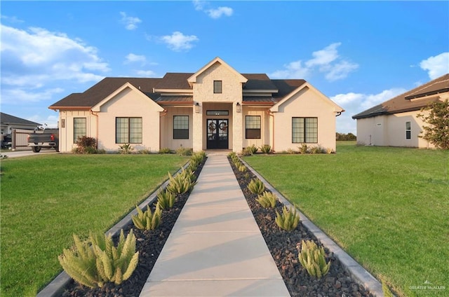 view of front facade with solar panels and a front yard