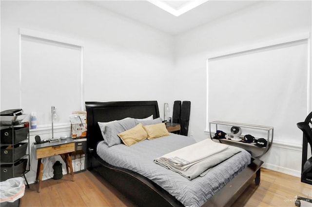 bedroom featuring hardwood / wood-style flooring