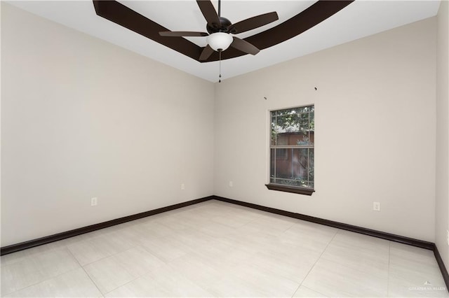 spare room with ceiling fan