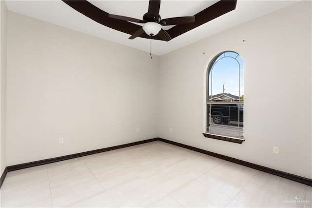 spare room with ceiling fan