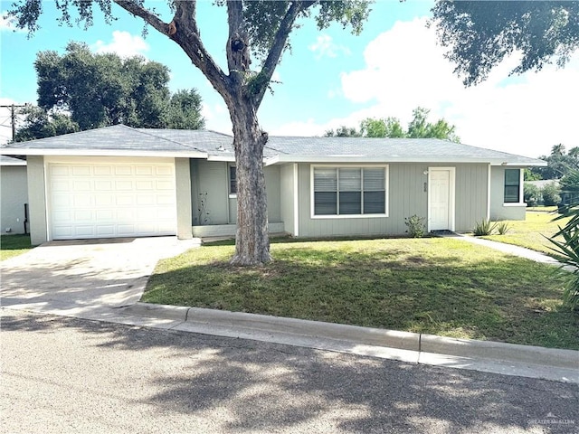 808 Tennessee Ave, Weslaco, TX 78596 - single story home with an attached garage, driveway, and a front yard