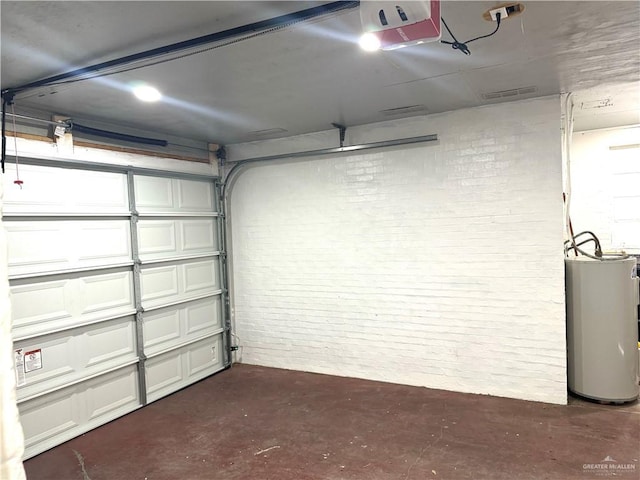 808 Tennessee Ave, Weslaco, TX 78596 - garage with water heater and a garage door opener