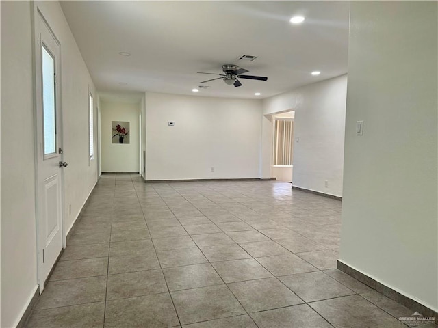 808 Tennessee Ave, Weslaco, TX 78596 - empty room with ceiling fan, recessed lighting, and light tile patterned floors