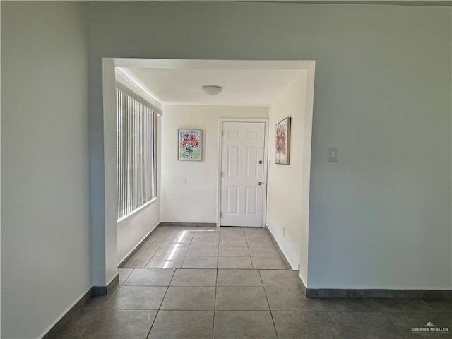 808 Tennessee Ave, Weslaco, TX 78596 - foyer featuring baseboards and tile patterned flooring