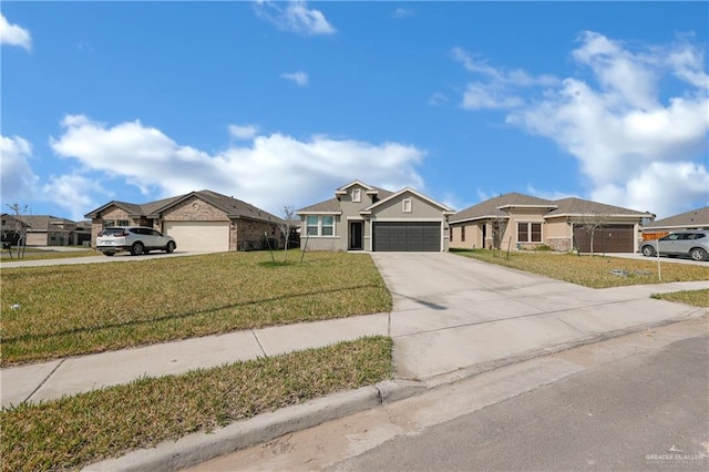 view of front of property with a garage and a front yard