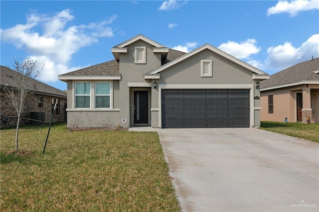 view of front of home featuring a garage, central AC, and a front yard