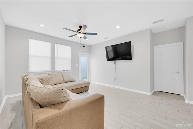 living room with ceiling fan