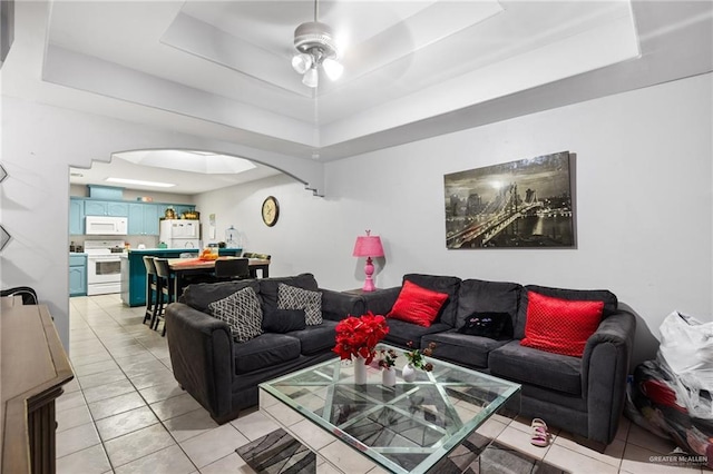 1504 Prosperity Dr, Edinburg, TX 78541 - living area with a raised ceiling, ceiling fan, arched walkways, and light tile patterned floors