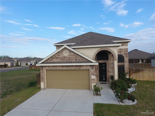 view of front of home featuring brick siding, concrete driveway, fence, a garage, and a front lawn