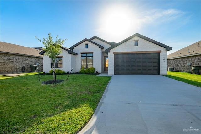 single story home with concrete driveway, cooling unit, a front lawn, brick siding, and a garage