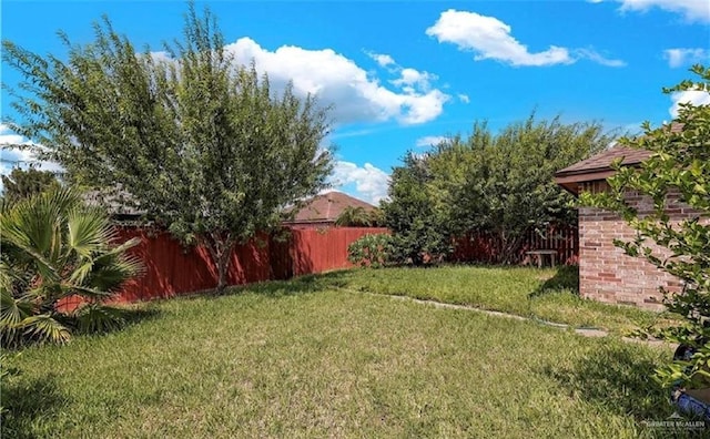 view of yard with fence