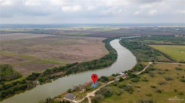 bird's eye view with a water view and a rural view