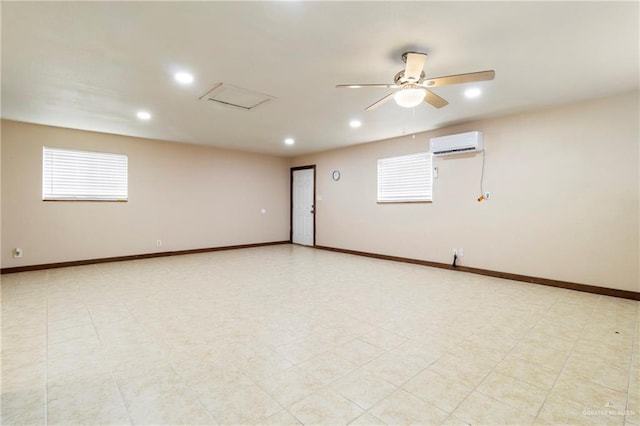 unfurnished room with an AC wall unit and ceiling fan