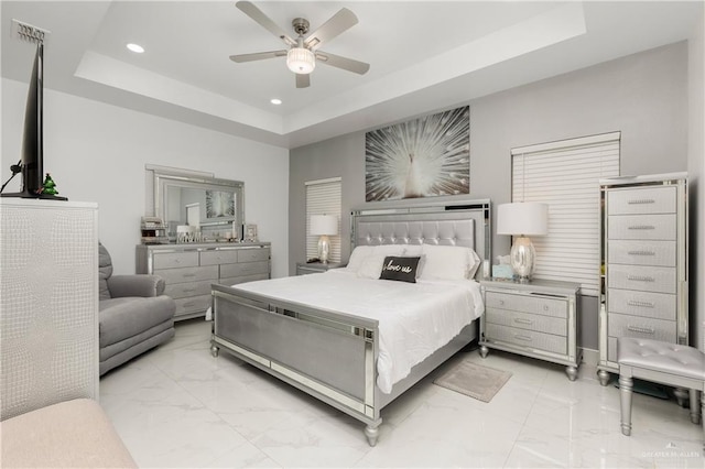 3108 E Bella Vista Ave, Alton, TX 78573 - bedroom featuring light marble finish floors, a raised ceiling, recessed lighting, and ceiling fan