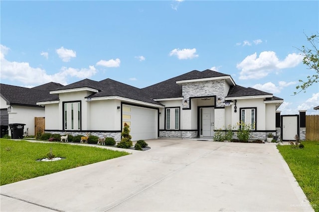3108 E Bella Vista Ave, Alton, TX 78573 - view of front of house featuring stone siding, stucco siding, a garage, a front yard, and driveway