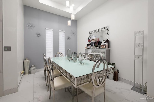3108 E Bella Vista Ave, Alton, TX 78573 - dining space with light marble finish flooring and baseboards
