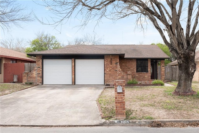 2013 Mynah Ave, Mcallen, TX 78504 - ranch-style home featuring roof with shingles, driveway, fence, a garage, and brick siding