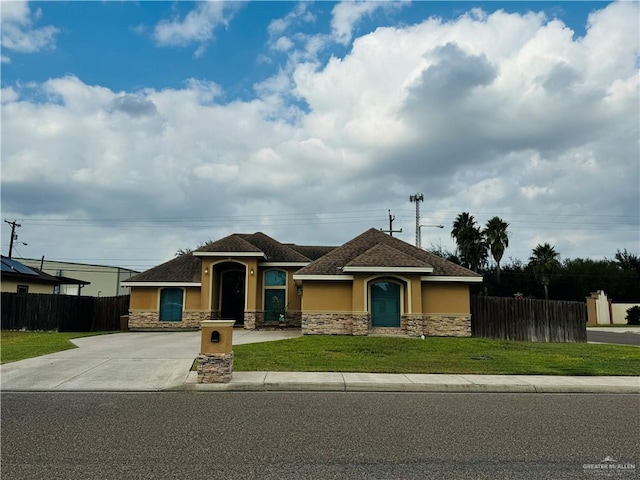 view of front of house with a front lawn