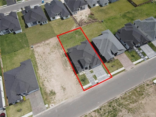 drone / aerial view with a residential view