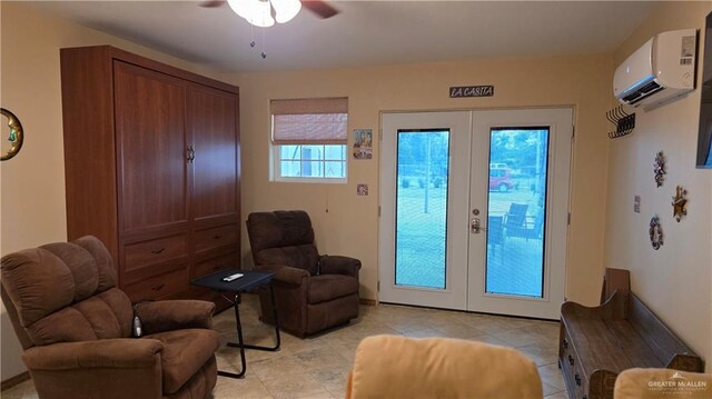 2422 Starling Cir E, Palmview, TX 78572 - sitting room featuring a wall mounted AC, ceiling fan, and light tile patterned floors