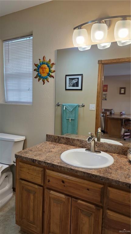 2422 Starling Cir E, Palmview, TX 78572 - bathroom with vanity and toilet