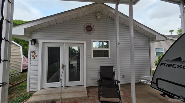 2422 Starling Cir E, Palmview, TX 78572 - rear view of property featuring french doors and a patio