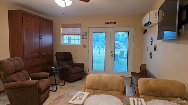 2422 Starling Cir E, Palmview, TX 78572 - living area featuring a wall mounted air conditioner, french doors, and a ceiling fan