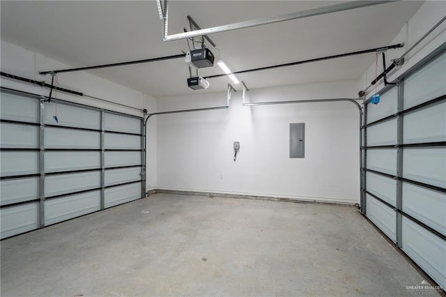 garage featuring a garage door opener and electric panel