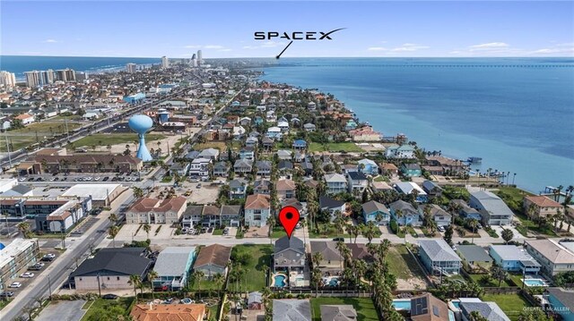 210 W Oleander St Unit B, South Padre Island, TX 78597 - aerial view of property and surrounding area with a large body of water and nearby suburban area