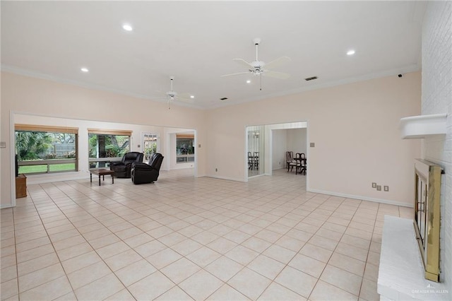 unfurnished living room with ornamental molding, light tile patterned flooring, a ceiling fan, and recessed lighting