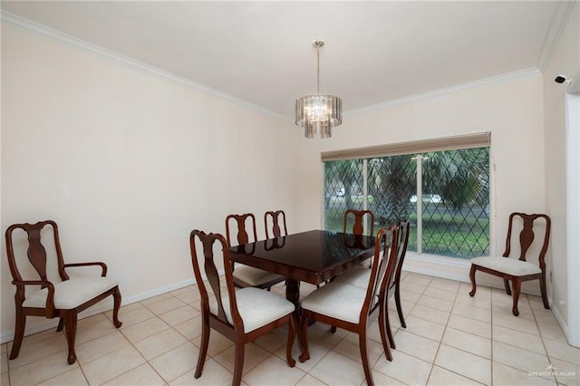 dining room featuring ornamental molding, light tile patterned flooring, a notable chandelier, and baseboards