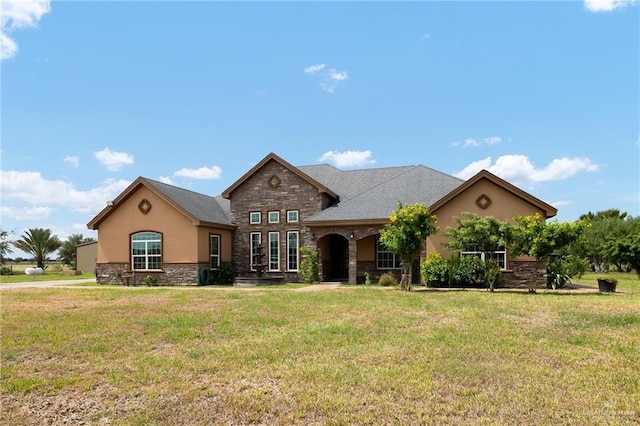 view of front of house with a front lawn