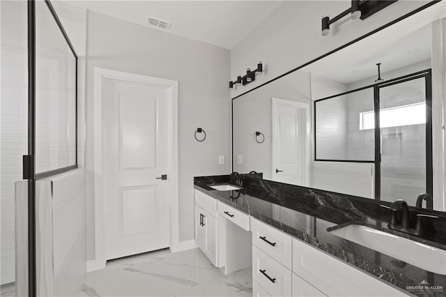 bathroom featuring double vanity, visible vents, marble finish floor, and a sink